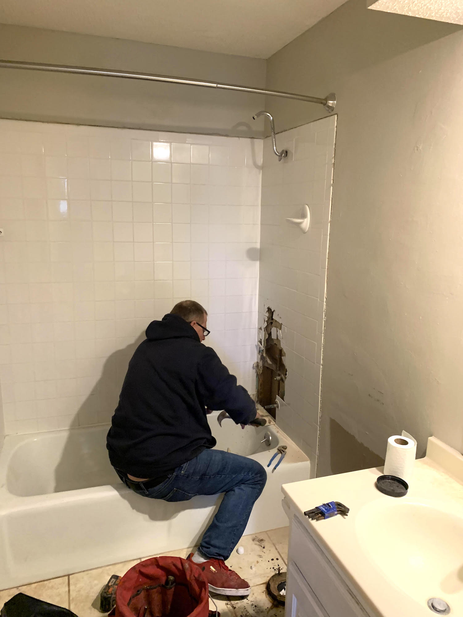 man renovating a bathroom